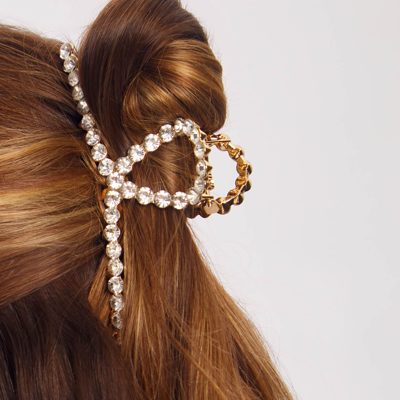 Clip ad anello con strass in metallo dorato