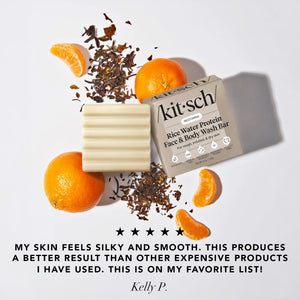 Rice Water Protein Face & Body Wash Bar with oranges and tea leaves, featuring a five-star customer review praising silky, smooth skin