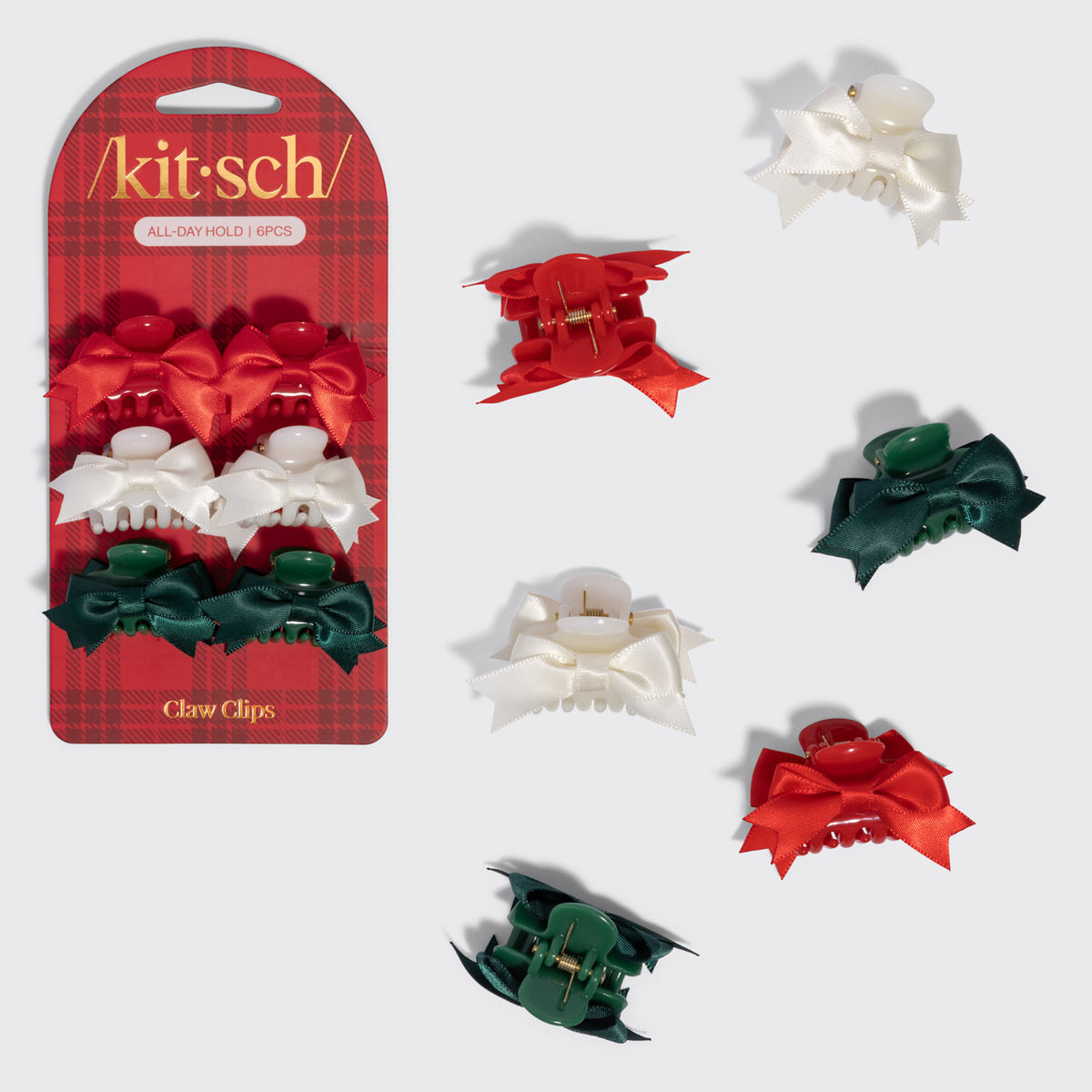 KITSCH Holiday Claw Clips 6pc Set - Mini — two red, two ivory and two green bow-topped mini claw clips beside the Kitsch packaging card — Clips back bangs and layers in seconds for effortless everyday styling — holiday hairstyles