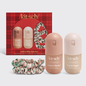 KITSCH Soft & Silky Hair 4pc Set — red plaid gift box shown with the Amber Shores and Warm Sugar mini hair perfumes and two ivory, red and green plaid satin scrunchies on a light gray backdrop — wear each hair perfume solo or layer them to create your own signature scent — quickly refreshes your hair between washes