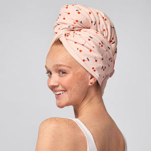KITSCH XL Hair Towel Wrap — Cherry Print — worn on model, twisted and secured with elastic strap