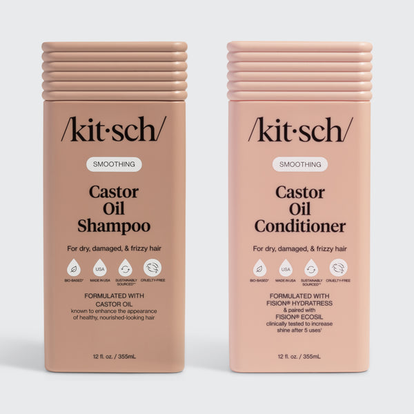 Two bottles of Kitsch Castor Oil Shampoo and Conditioner on a white background