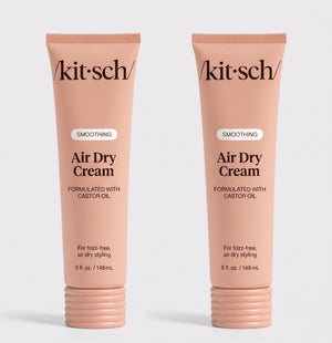 Two tubes of Kitsch Smoothing Air Dry Cream formulated with castor oil, 5 fl. oz. (148 mL), displayed side by side on a white background for frizz-free, air-dry styling.